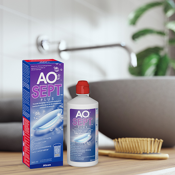 AO Sept contact lens solution standing on a table.